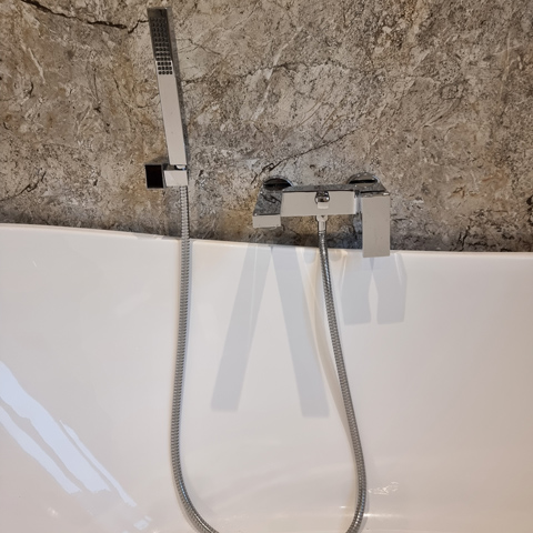 over-bath shower installed by JDN Plumbing and Heating